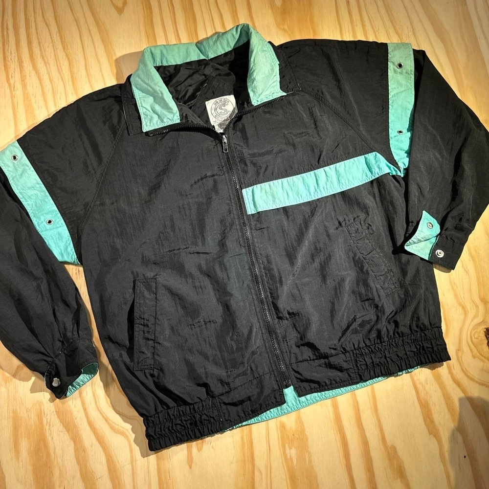 90s be the current seen black windbreaker with teal color blocking